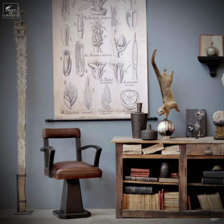Fauteuil de coiffeur noir antique tapissé cuir