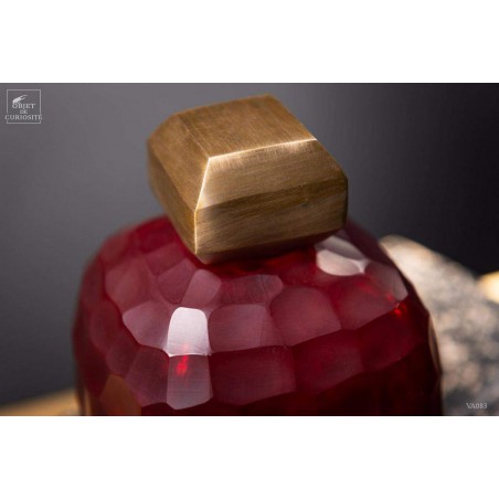 Red grenade vase with brass stopper