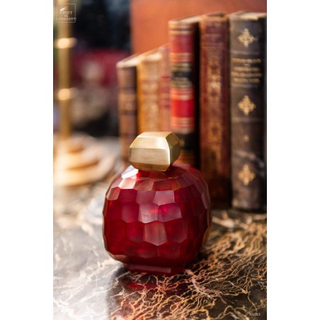 Red grenade vase with brass stopper