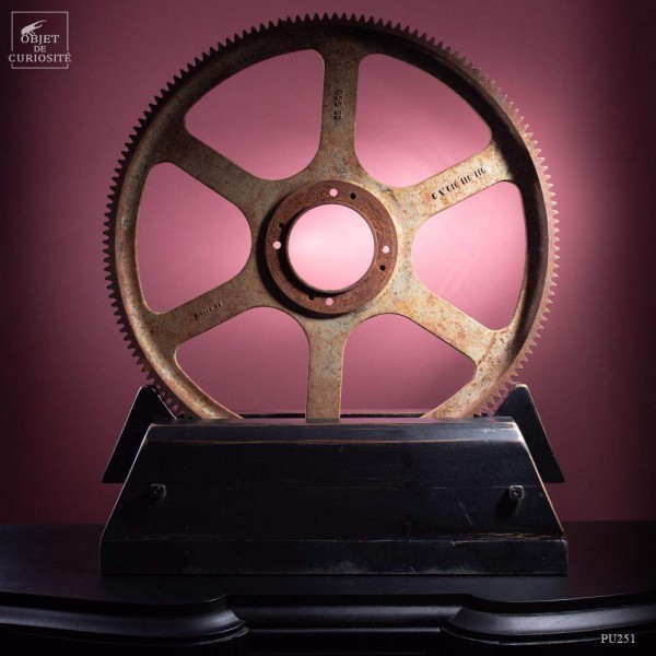 Giant Gear on solid black wood stand