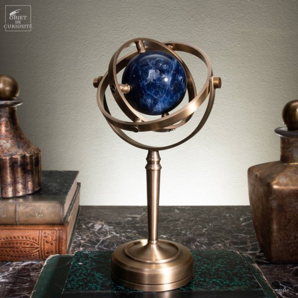 Sodalite ball,in spinning brass stand