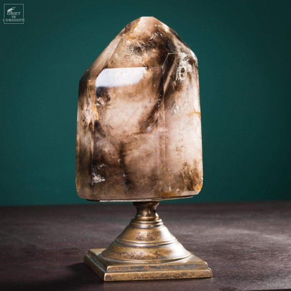 Head smocky crystal on brass base...