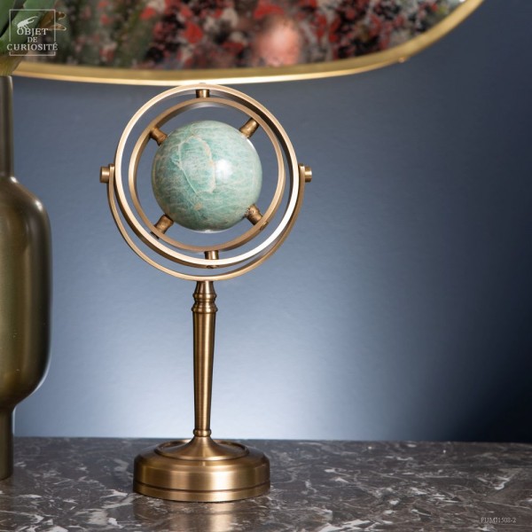 Green amazonite ball, spinning brass...