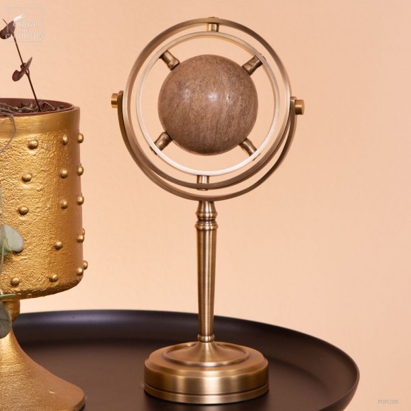 Os de dinosaure en sphère dans...