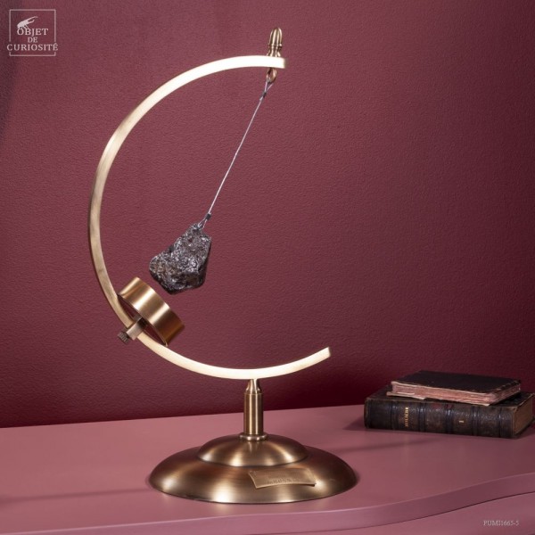 Meteorite from Argentina in brass circle