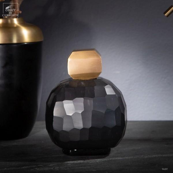 Black grenade vase with brass stopper