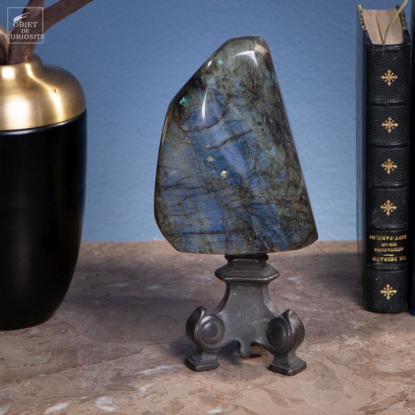 Polished labradorite on black brass
