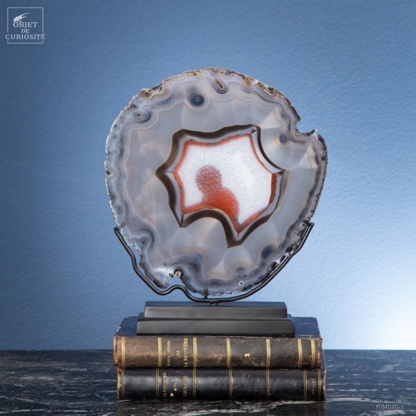 Agate slice on black base