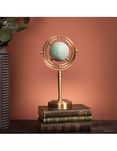 Green amazonite ball, spinning brass...