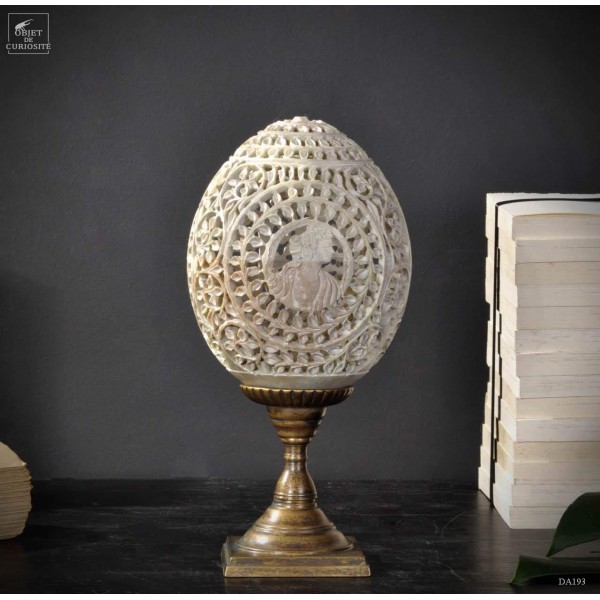 Carved stone with cameo on brass