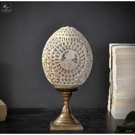 Carved stone with cameo on brass