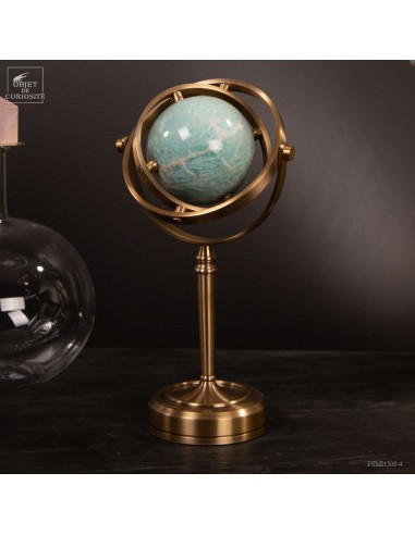 Green amazonite ball, spinning brass...