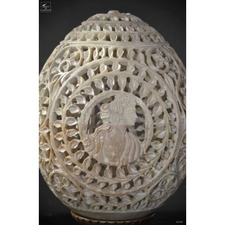 Carved stone with cameo on brass