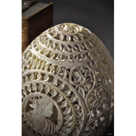 Carved stone with cameo on brass
