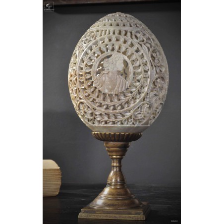 Carved stone with cameo on brass