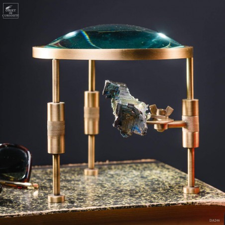 Magnifying glass on stand with bismuth
