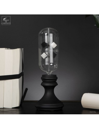 Two-way oval radiometer on black stand
