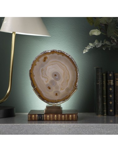 Golden agate slice on brass base