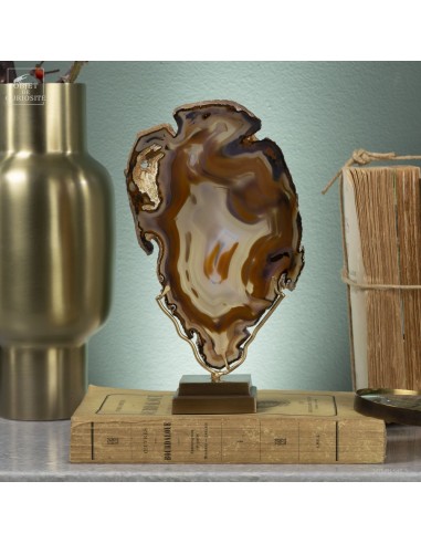 Golden agate slice on brass base
