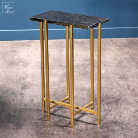 Black marble table with brass feet
