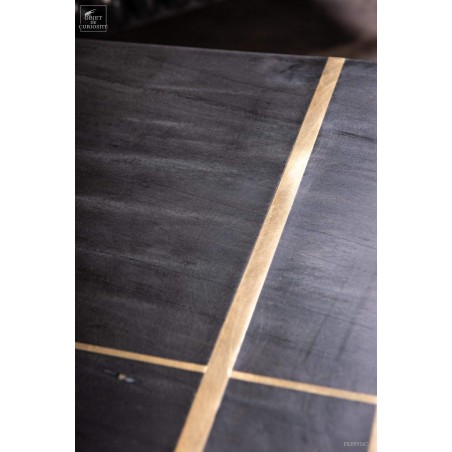 coffee table in black marble with brass lines inlay.