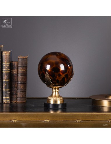 Leopard glass bowl on brass and...