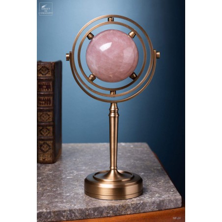 Pink quartz ball, spinning brass stand