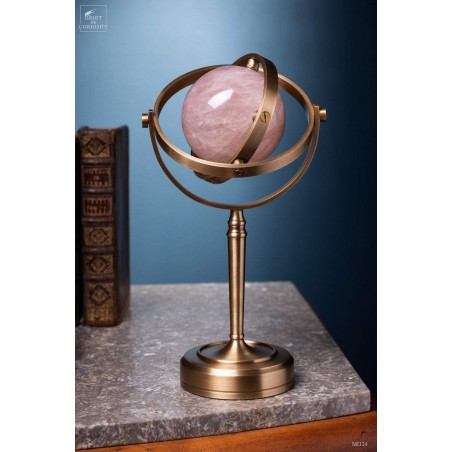 Pink quartz ball, spinning brass stand