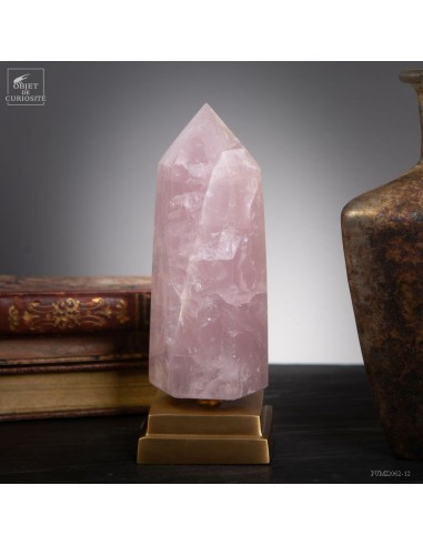 Polished pink quartz on brass base