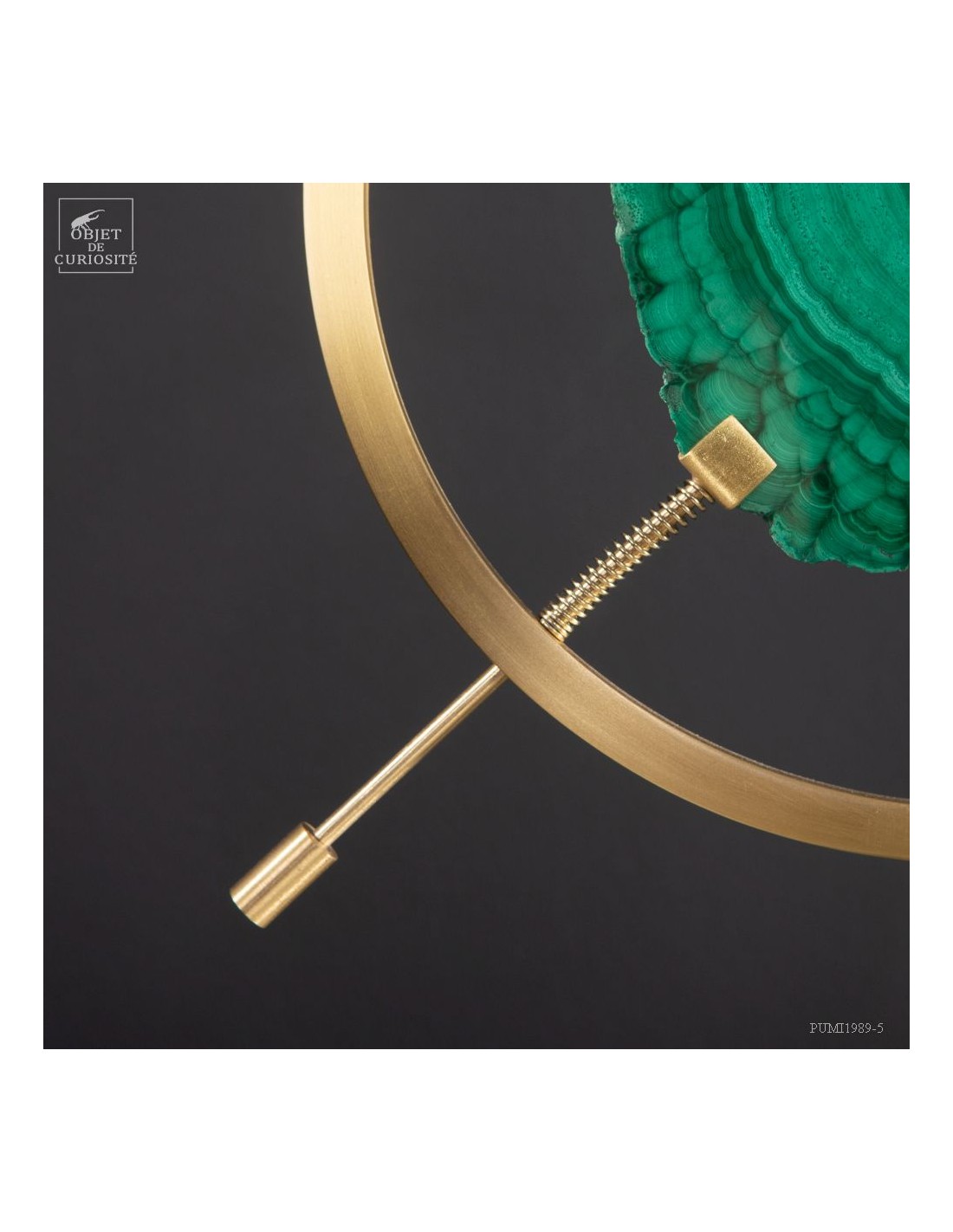 Slice of malachite in brass... Slice of malachite in brass...