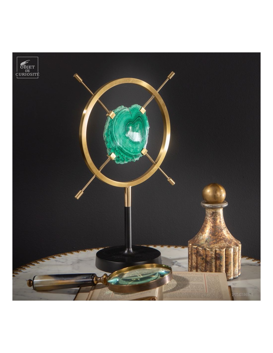 Slice of malachite in brass... Slice of malachite in brass...