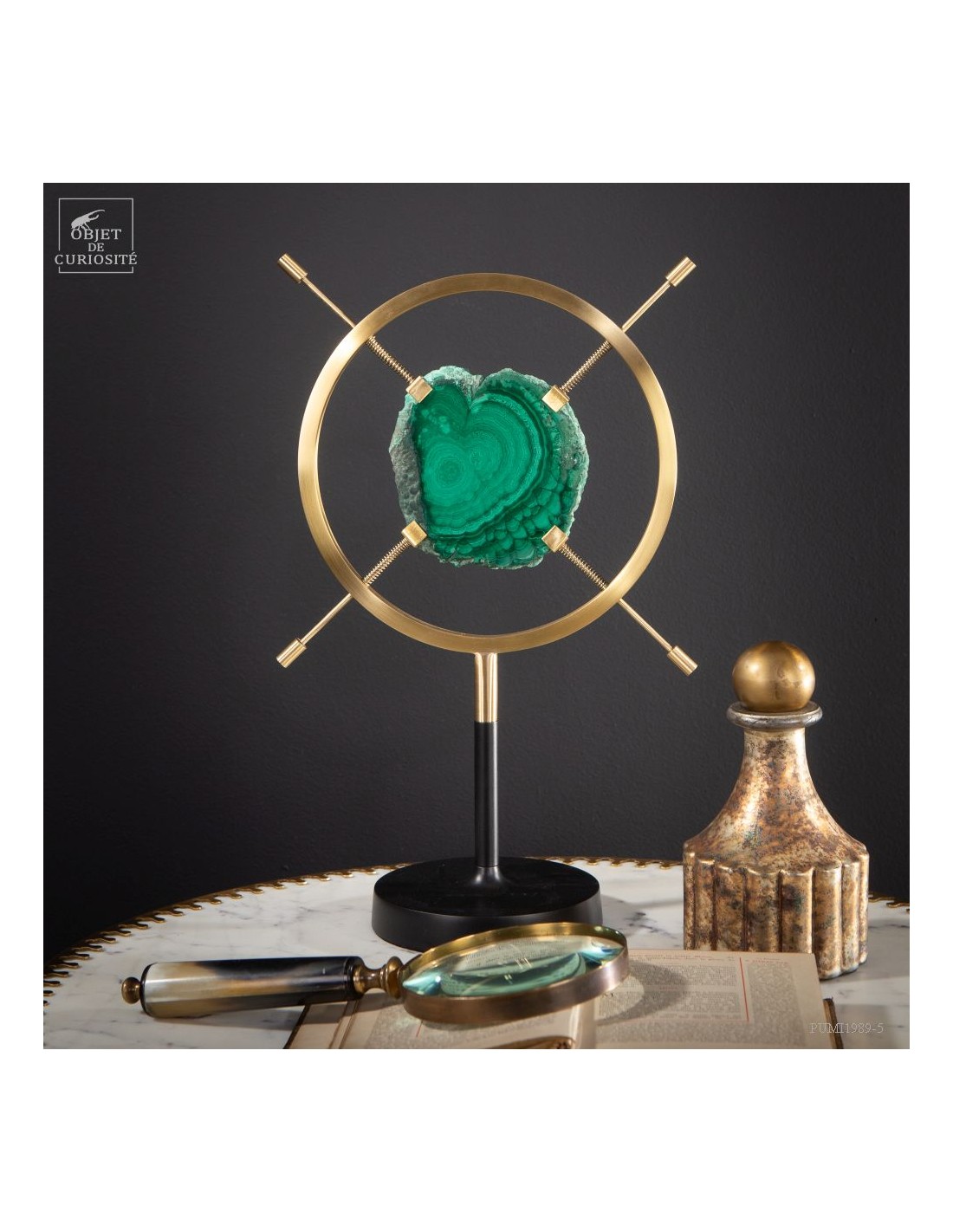 Slice of malachite in brass... Slice of malachite in brass...