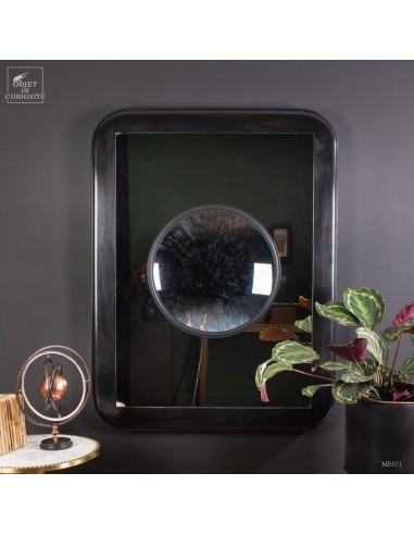 Moon mirror inside a large mirror