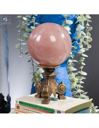 Pink quartz ball, brass stand