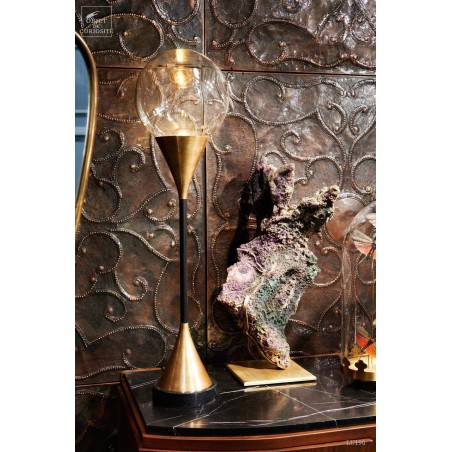Glass ball and brass lamp