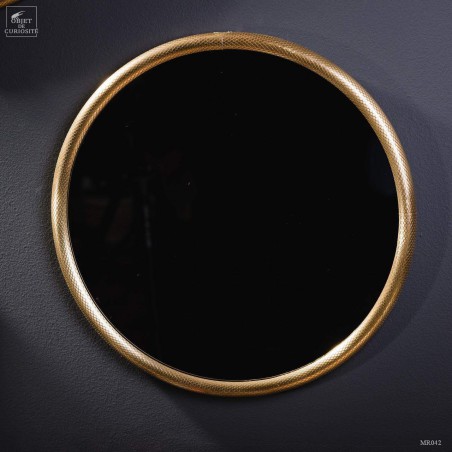 Miroir rond cadre laiton motif lézard.
