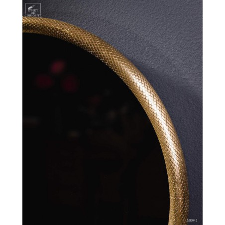 Miroir rond cadre laiton motif lézard.