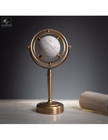 White agate ball, spinning brass stand