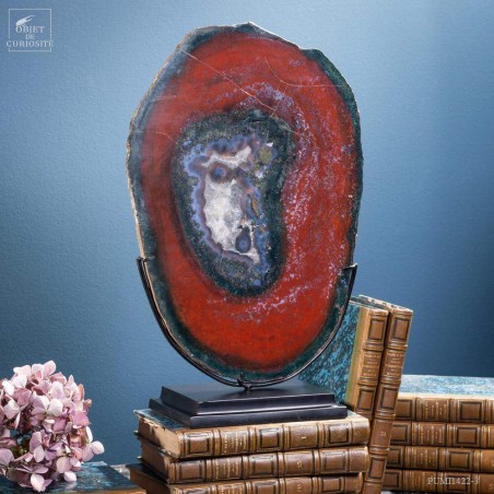 Slice of red jasper from Brazil, on black base
