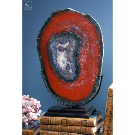 Slice of red jasper from Brazil, on black base