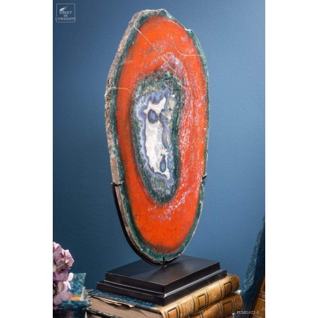 Slice of red jasper from Brazil, on black base