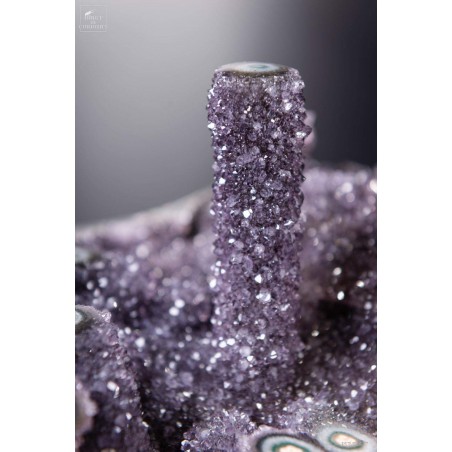 Uruguay amethyst on brass base